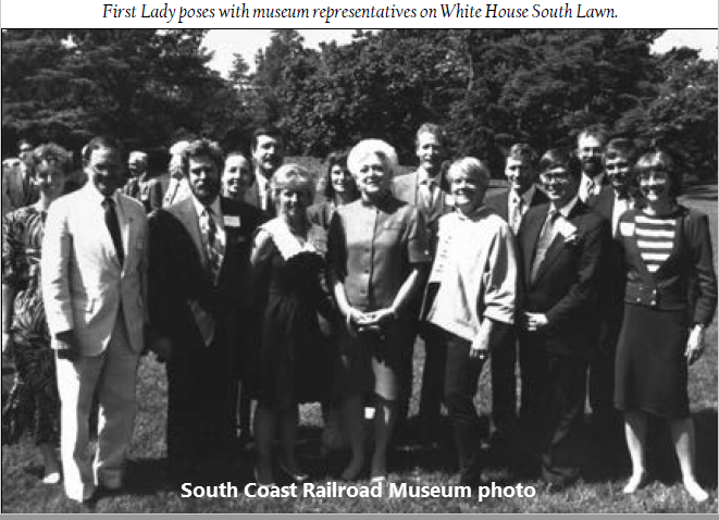 First Lady Barbara Bush poses with museum representatives on White House South Lawn